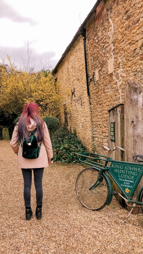 King John's Hunting Lodge, Bike, Pink Hair, Lacock, Wiltshire, Cotswolds, UK, National Trust, England, English Countryside
